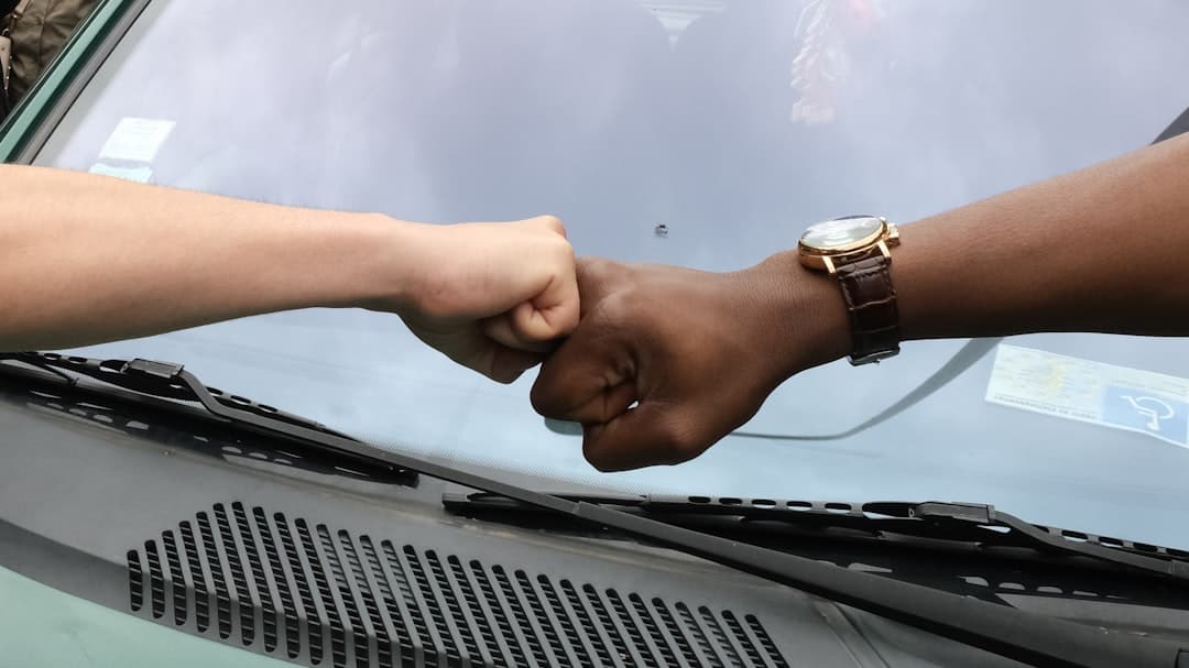 Fist bump representing relationship-based lending